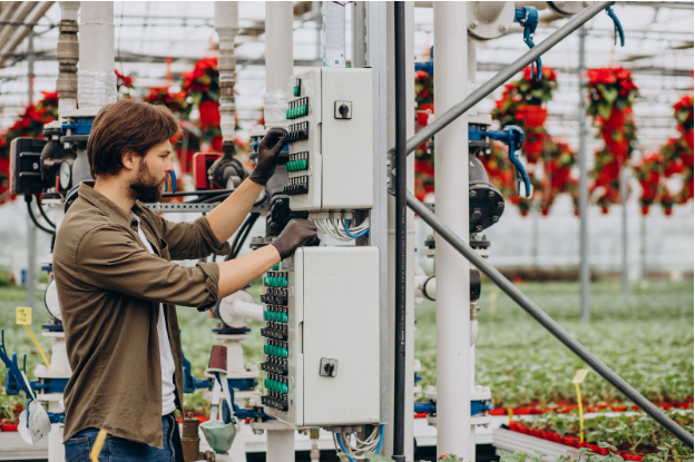 Licensed electrician installing generator transfer switch at a Tampa commercial property – Kazar’s Electric, Inc
